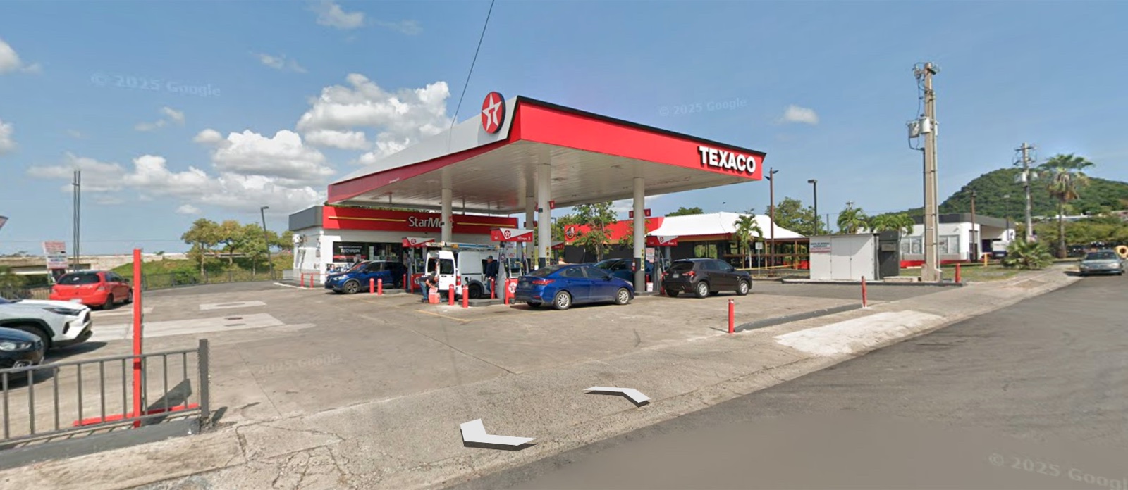 Vista de Google Earth compartida de la estación Texaco en MIDWAY